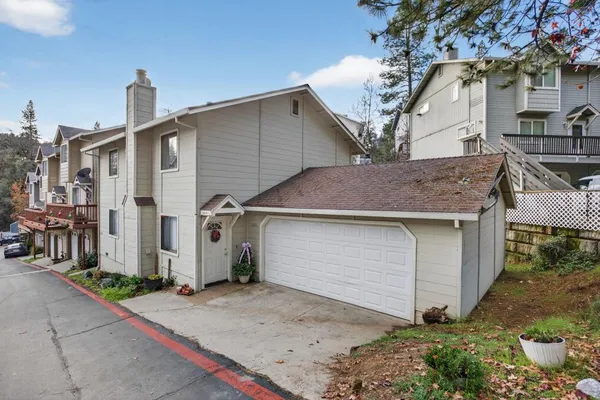 a house view with a outdoor space