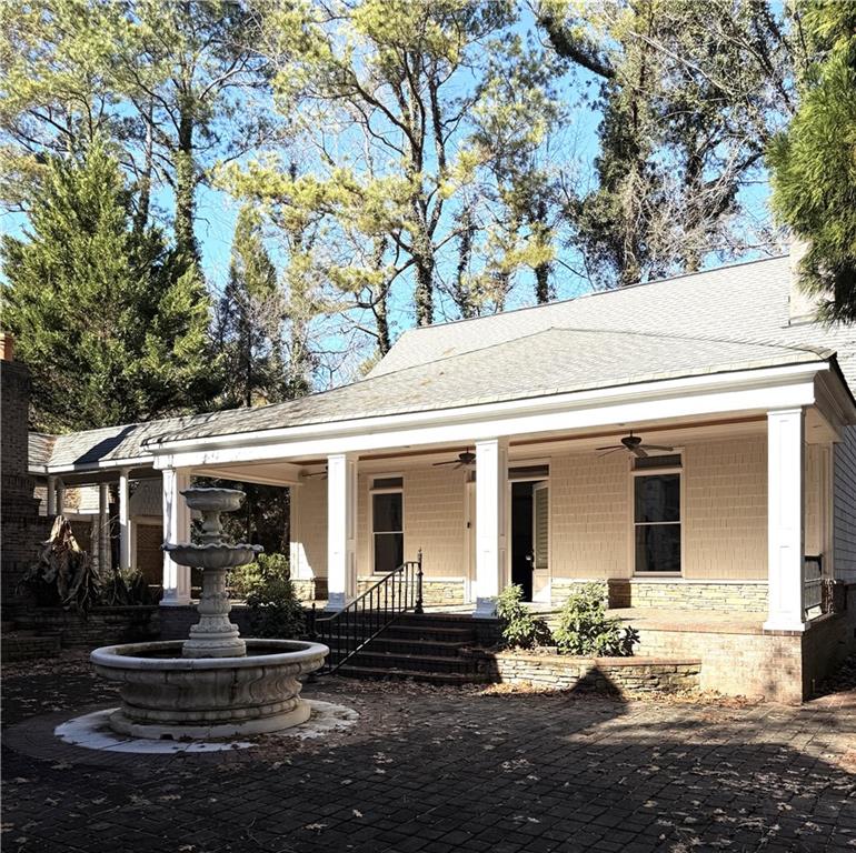 13039 Freemanville Road Alpharetta, GA 30004 - Photo 22 of 28 a front view of house with yard and seating area