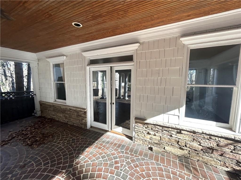 13039 Freemanville Road Alpharetta, GA 30004 - Photo 27 of 28 a bathroom with a sink and a mirror