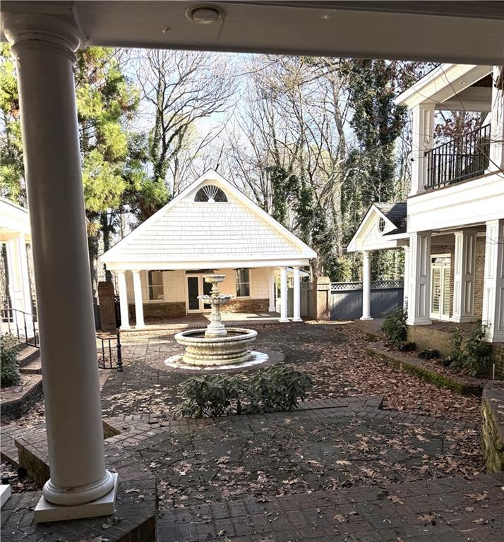13039 Freemanville Road Alpharetta, GA 30004 - Photo 28 of 28 a front view of a house with garden