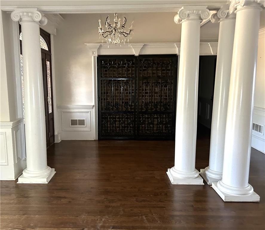 13039 Freemanville Road Alpharetta, GA 30004 - Photo 6 of 28 a view of front door with wooden floor