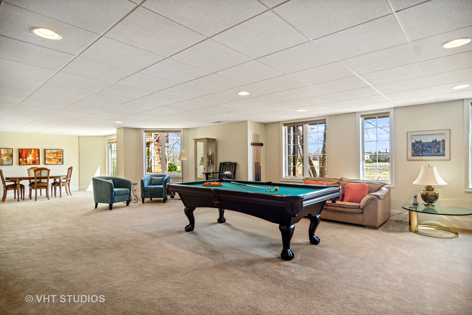 1015 Ridgeview Drive Inverness, IL 60010 - Photo 20 of 29 a living room with furniture a table and a large window