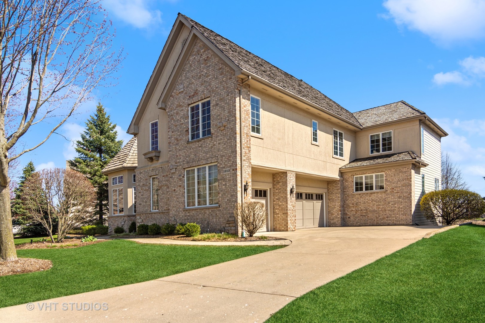 1015 Ridgeview Drive Inverness, IL 60010 - Photo 2 of 29 a front view of a house with a yard