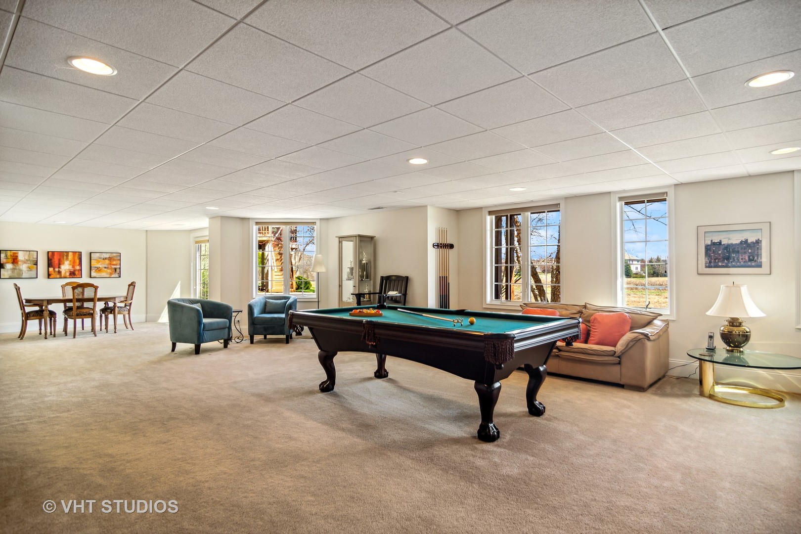 1015 Ridgeview Drive Inverness, IL 60010 - Photo 21 of 29 a living room with furniture a table and gym equipment
