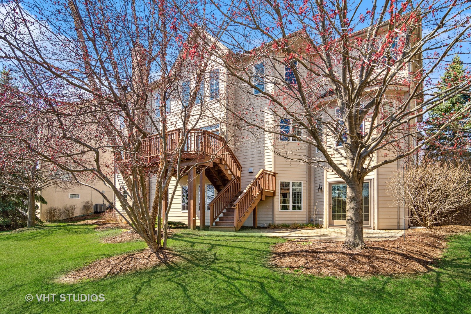 1015 Ridgeview Drive Inverness, IL 60010 - Photo 24 of 29 a big tree in middle of the garden