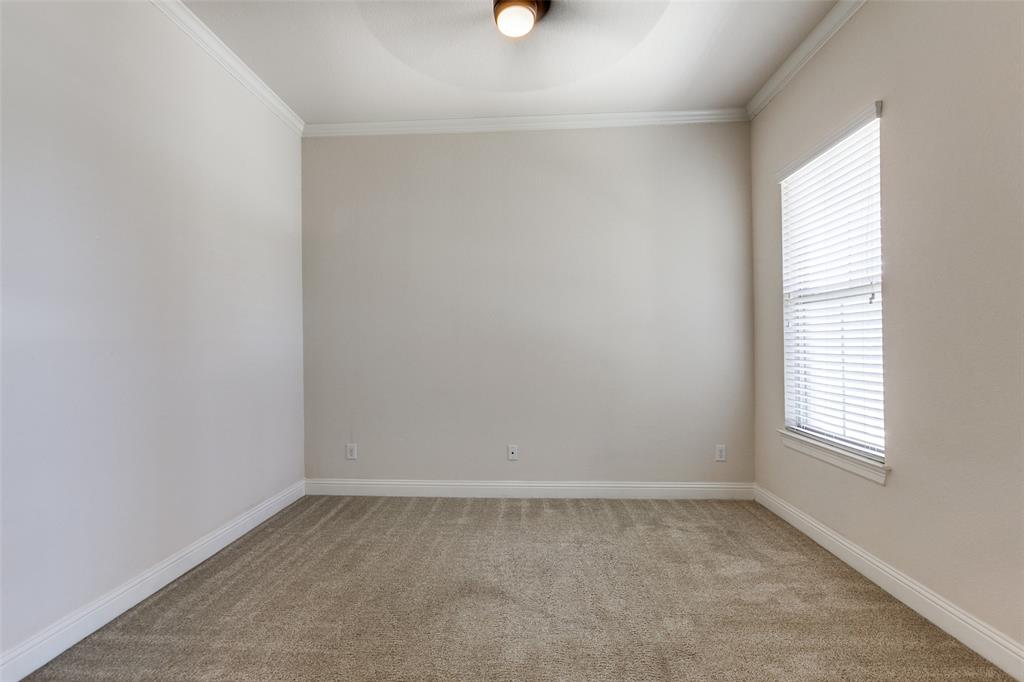 12618 Akenside Road Frisco, TX 75035 - Photo 22 of 31 Carpeted spare room with ceiling fan and ornamental molding