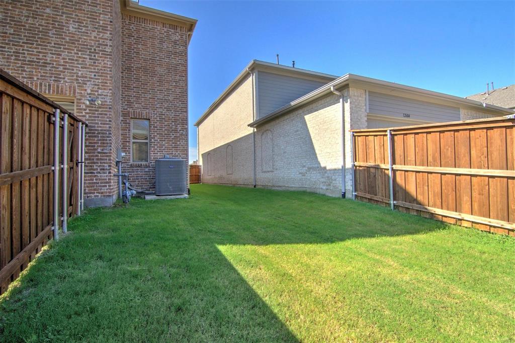 12618 Akenside Road Frisco, TX 75035 - Photo 26 of 31 View of yard with cooling unit