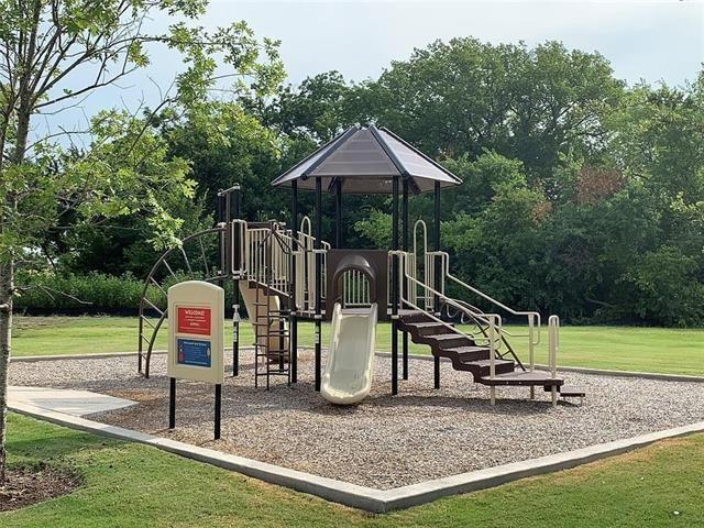 12618 Akenside Road Frisco, TX 75035 - Photo 30 of 31 View of play area featuring a lawn