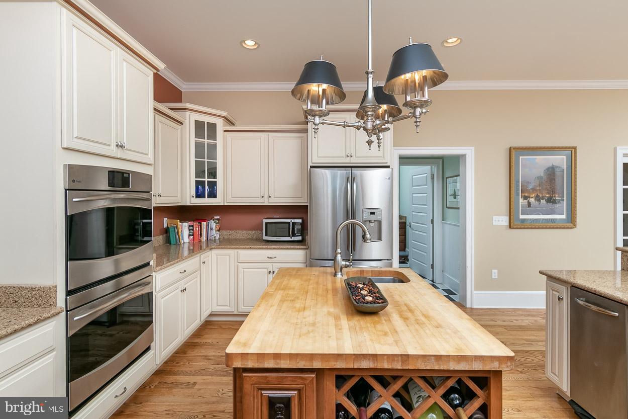 5547 Whitehall Road Cambridge, MD 21613 - Photo 20 of 60 Island With Wine Storage and Custom Stain