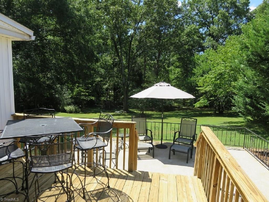 221 Pine Ridge Drive High Point, NC 27262 - Photo 1 of 25 This wonderful deck and concrete patio overlooks .64 acre lot - just an extension of your living space