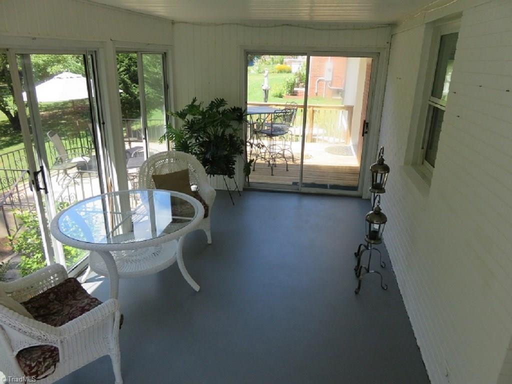 221 Pine Ridge Drive High Point, NC 27262 - Photo 14 of 25 Sunroom 18.5 x 9.6 not included in square footage (not heated/cooled)
