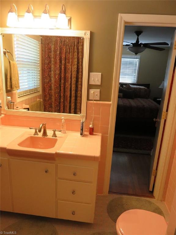221 Pine Ridge Drive High Point, NC 27262 - Photo 16 of 25 Master bath with original tiles in IMMACULATE condition