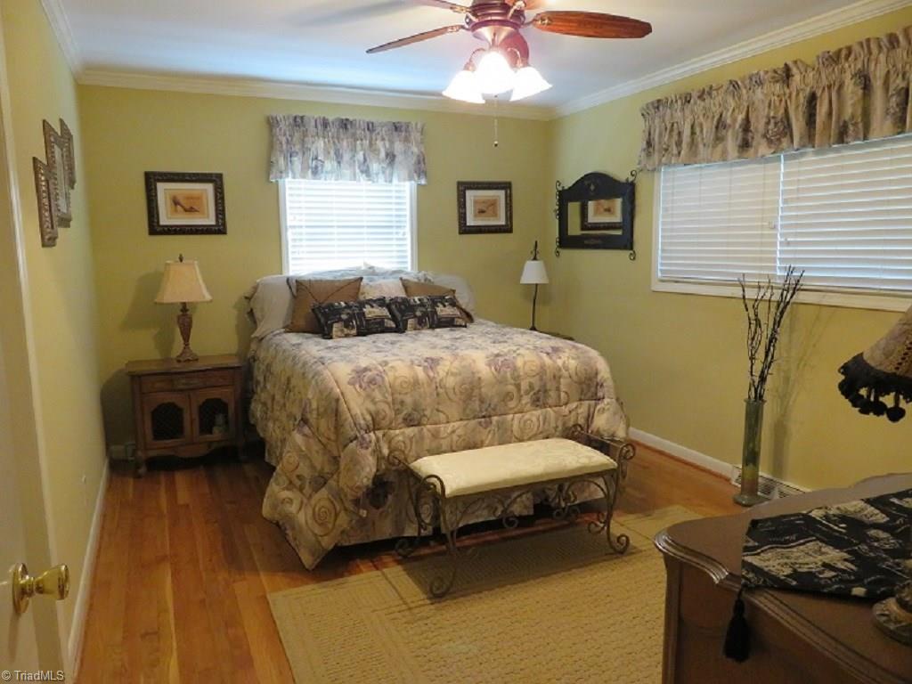221 Pine Ridge Drive High Point, NC 27262 - Photo 17 of 25 2nd bedroom also has it's own private bath. Two master suites in this charming home.