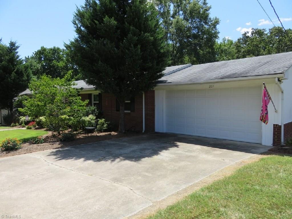 221 Pine Ridge Drive High Point, NC 27262 - Photo 21 of 25 One level all brick ranch with 2 car attached garage. New roof to be installed Aug. 2016