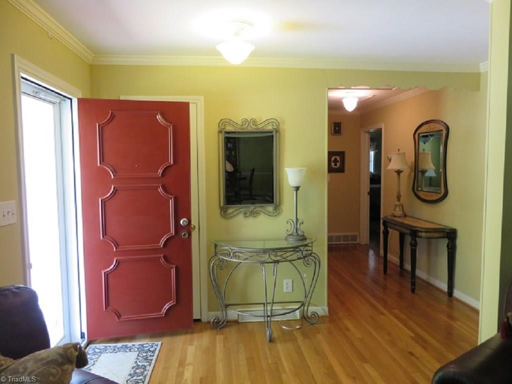 221 Pine Ridge Drive High Point, NC 27262 - Photo 4 of 25 Gorgeous wood flooring and crown moldings throughout