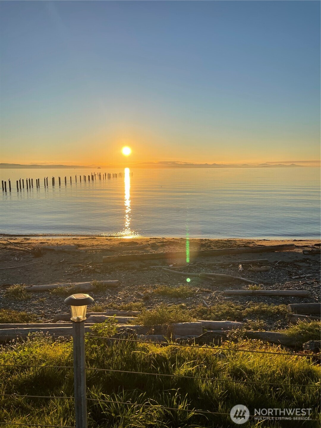 1334 Gulf Road Point Roberts, WA 98281 - Photo 20 of 38 a view of an ocean from a beach