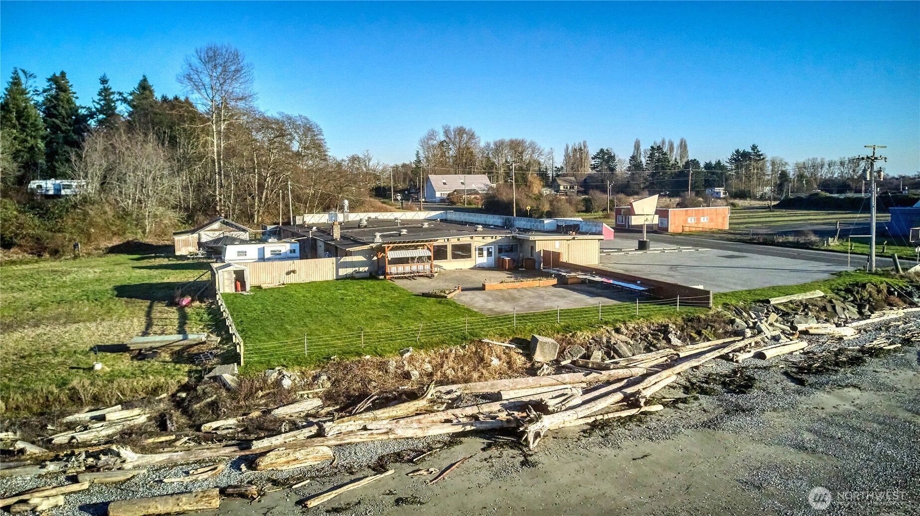 1334 Gulf Road Point Roberts, WA 98281 - Photo 5 of 38 a view of a golf course with chairs