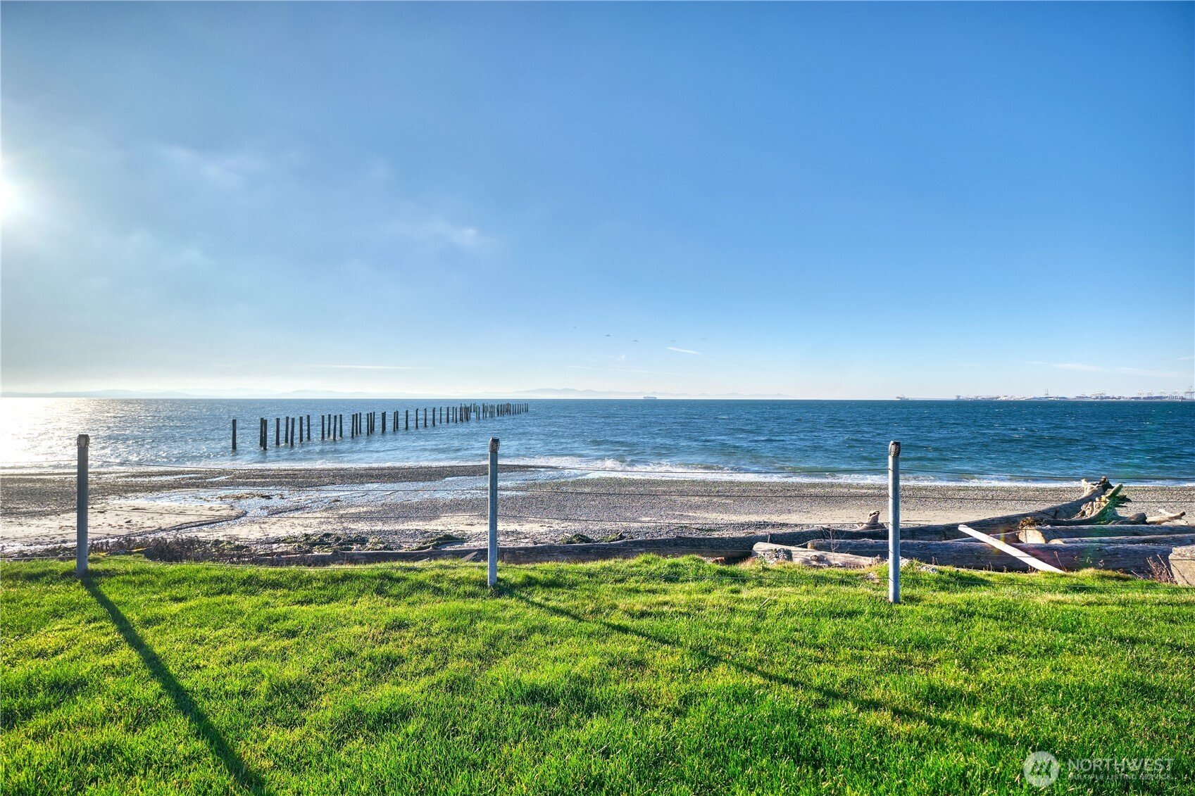 1334 Gulf Road Point Roberts, WA 98281 - Photo 8 of 38 a view of a backyard with a ocean view