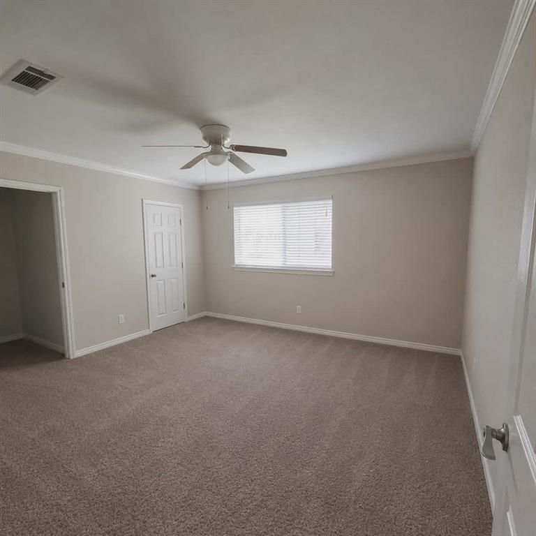 14752 Ranch Road Forney, TX 75126 - Photo 16 of 40 Carpeted room featuring a ceiling fan with light, crown molding, baseboards, and a window with blinds-This photo was taken before family moved in