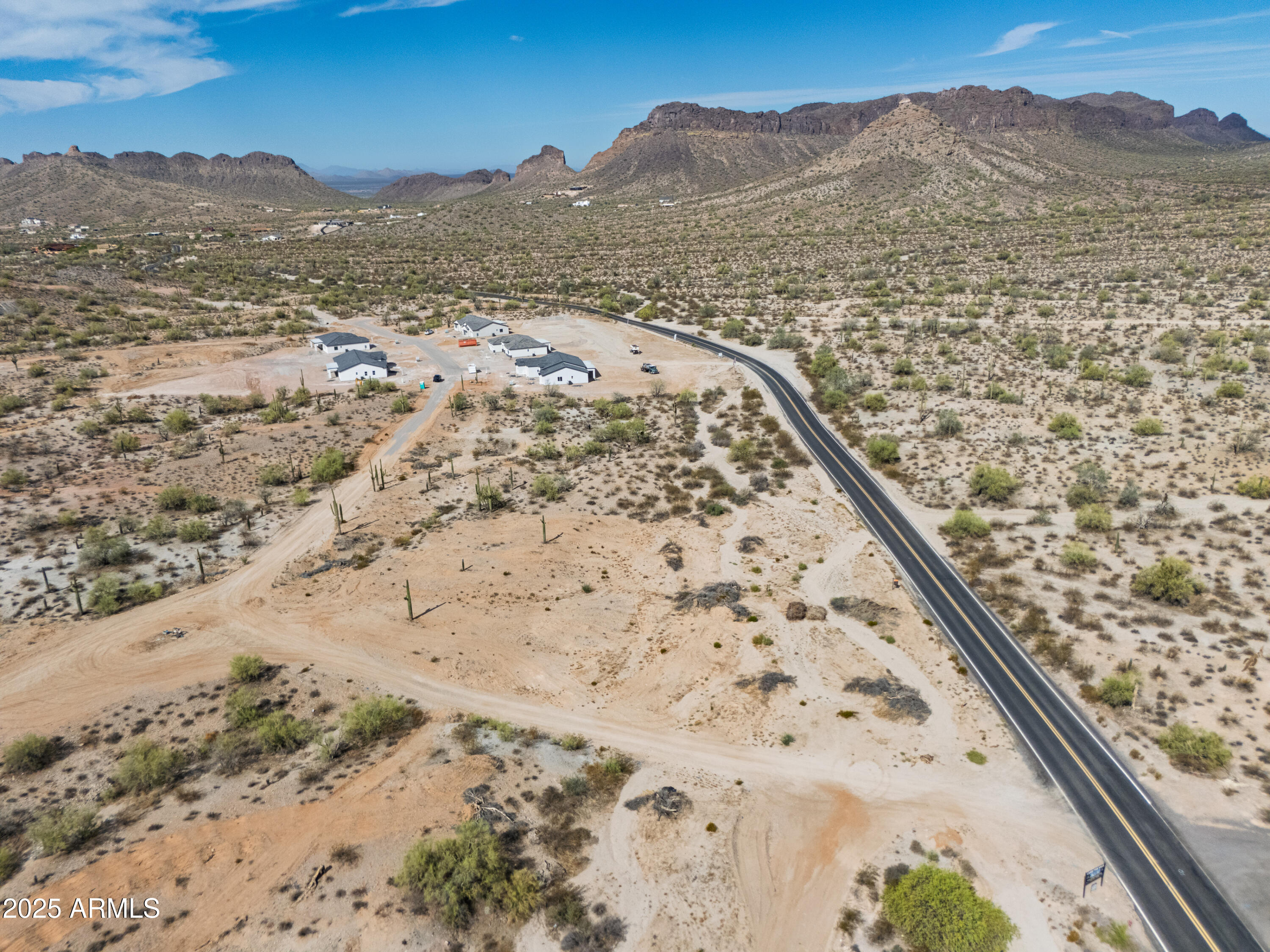 0 North Brenner Pass Road, Unit H Queen Creek, AZ 85144 - Photo 6 of 20 a view of a mountain with wooden fence