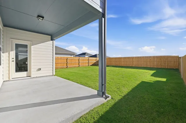 a view of a garden with an empty room