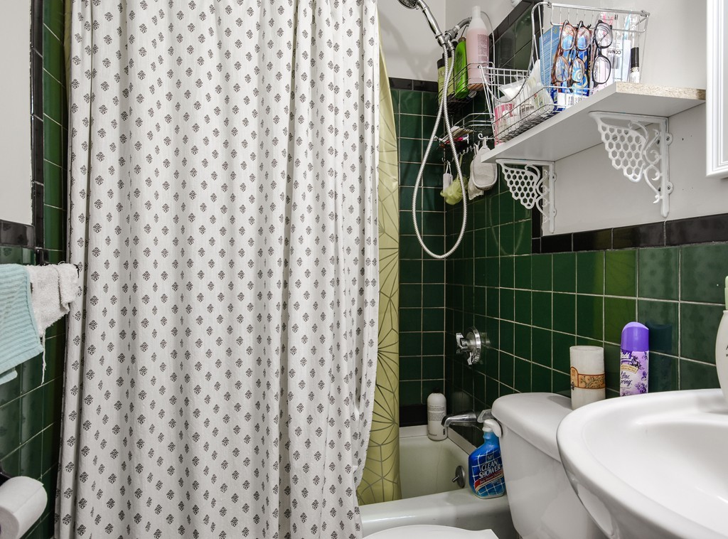 25 North Main Street Natick, MA 01760 - Photo 11 of 16 a bathroom with a sink toilet and shower