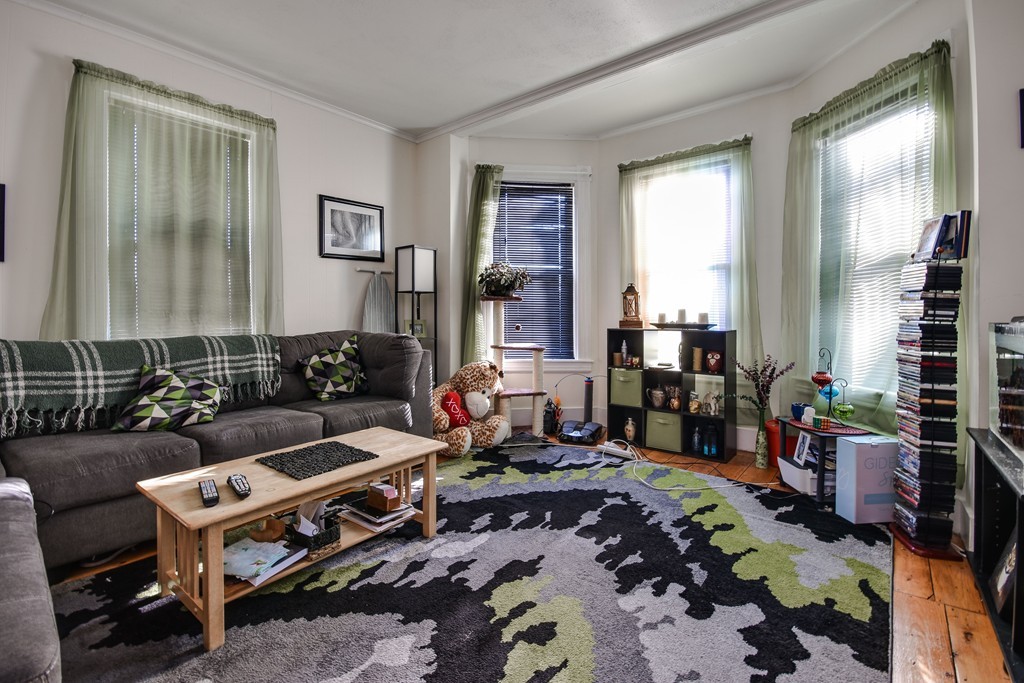 25 North Main Street Natick, MA 01760 - Photo 2 of 16 a room with furniture