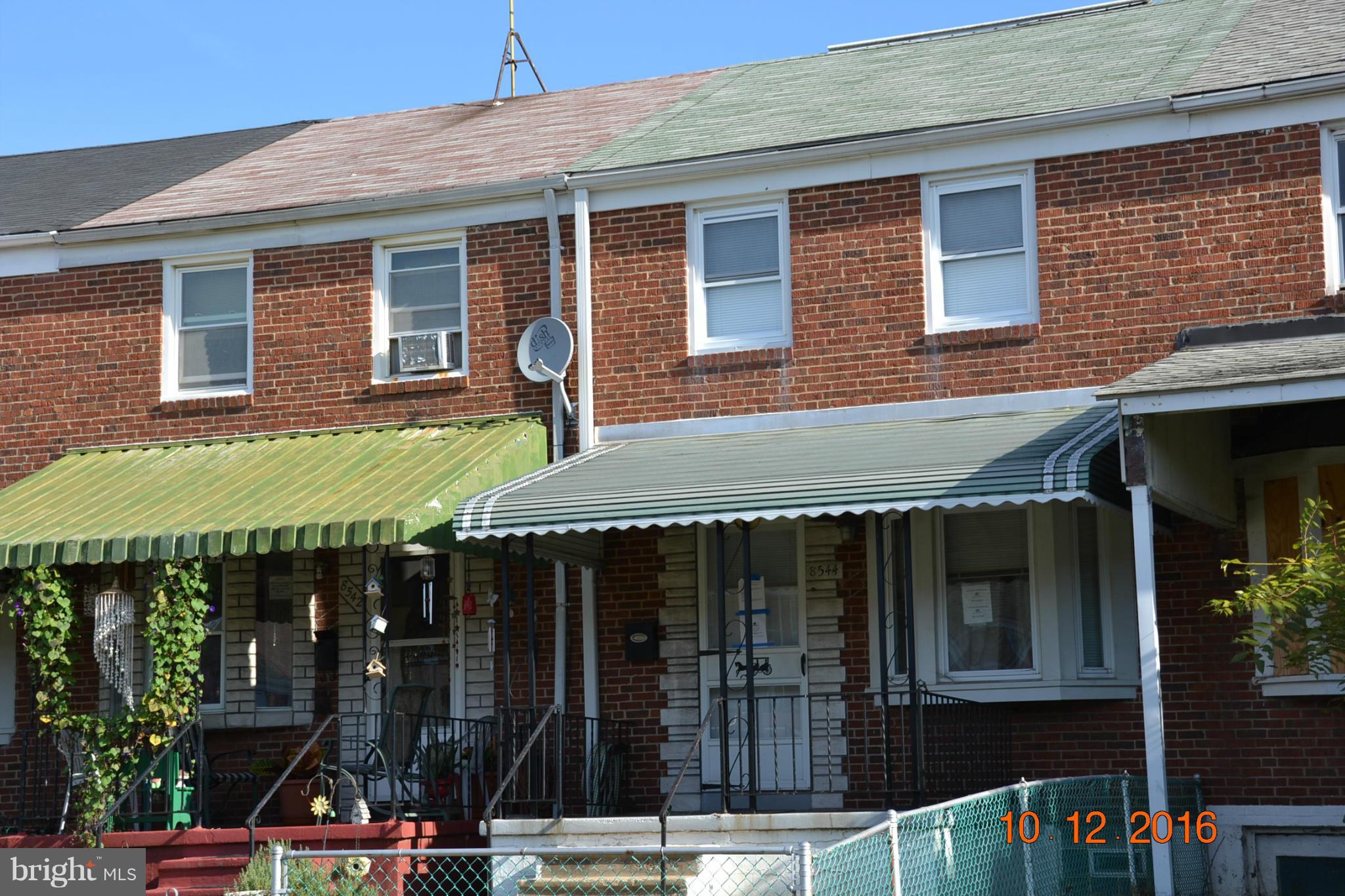 8544 Kavanagh Road Baltimore, MD 21222 - Photo 1 of 14 a view of parked car garage