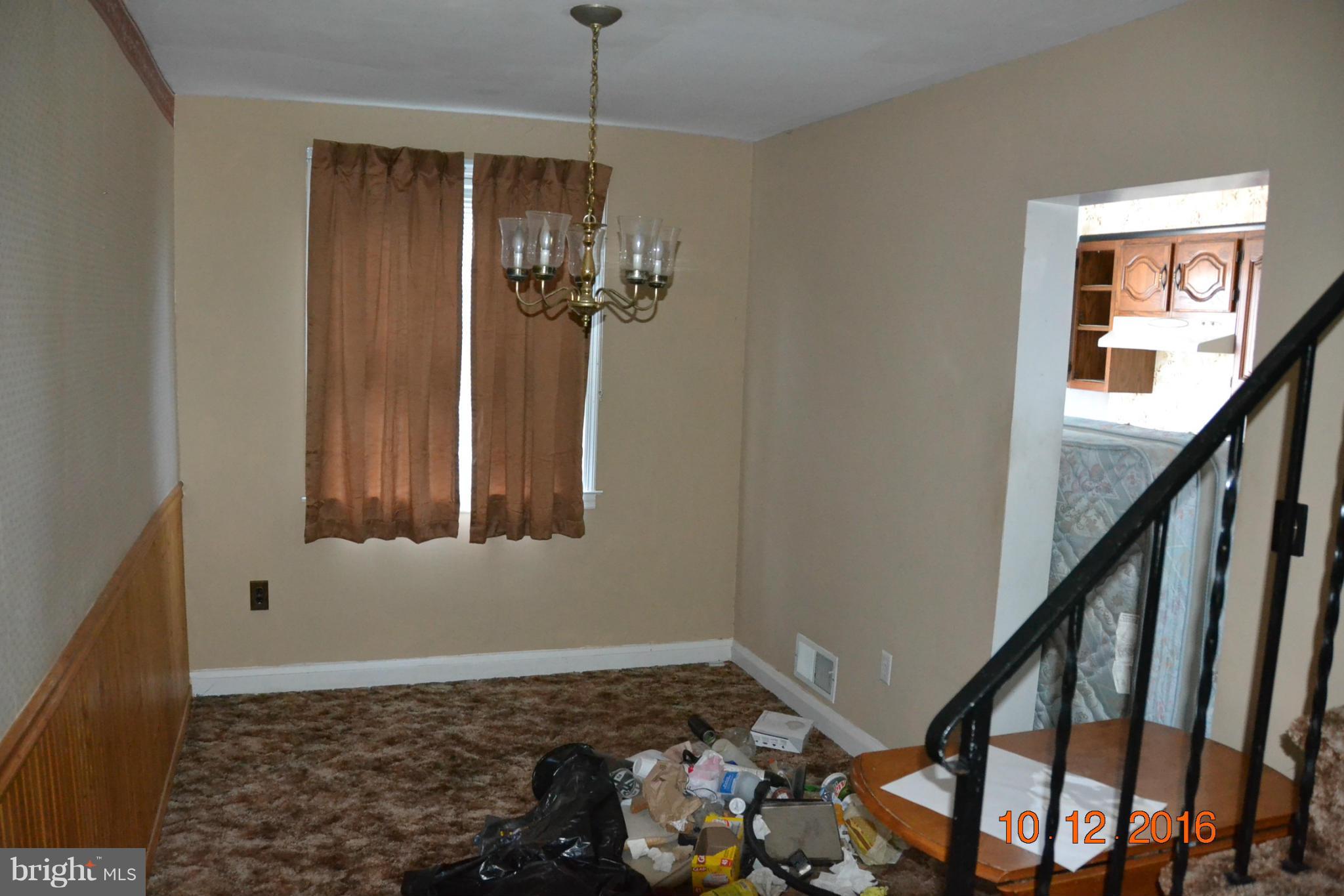 8544 Kavanagh Road Baltimore, MD 21222 - Photo 6 of 14 a view of entryway and hall with wooden floor
