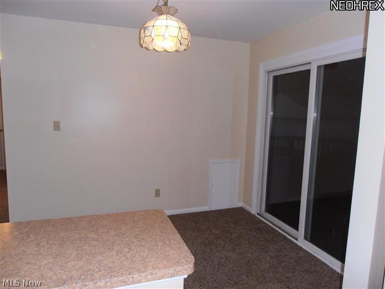 691 Sterling Road Wickliffe, OH 44092 - Photo 4 of 12 Formal dining room with slider to deck