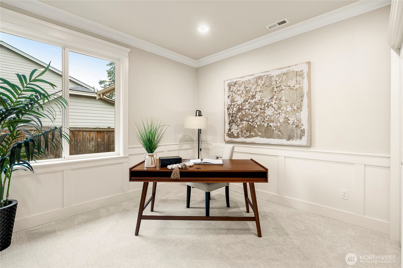 24026 Meridian Avenue South Bothell, WA 98021 - Photo 14 of 30 a view of a workspace with furniture and a window