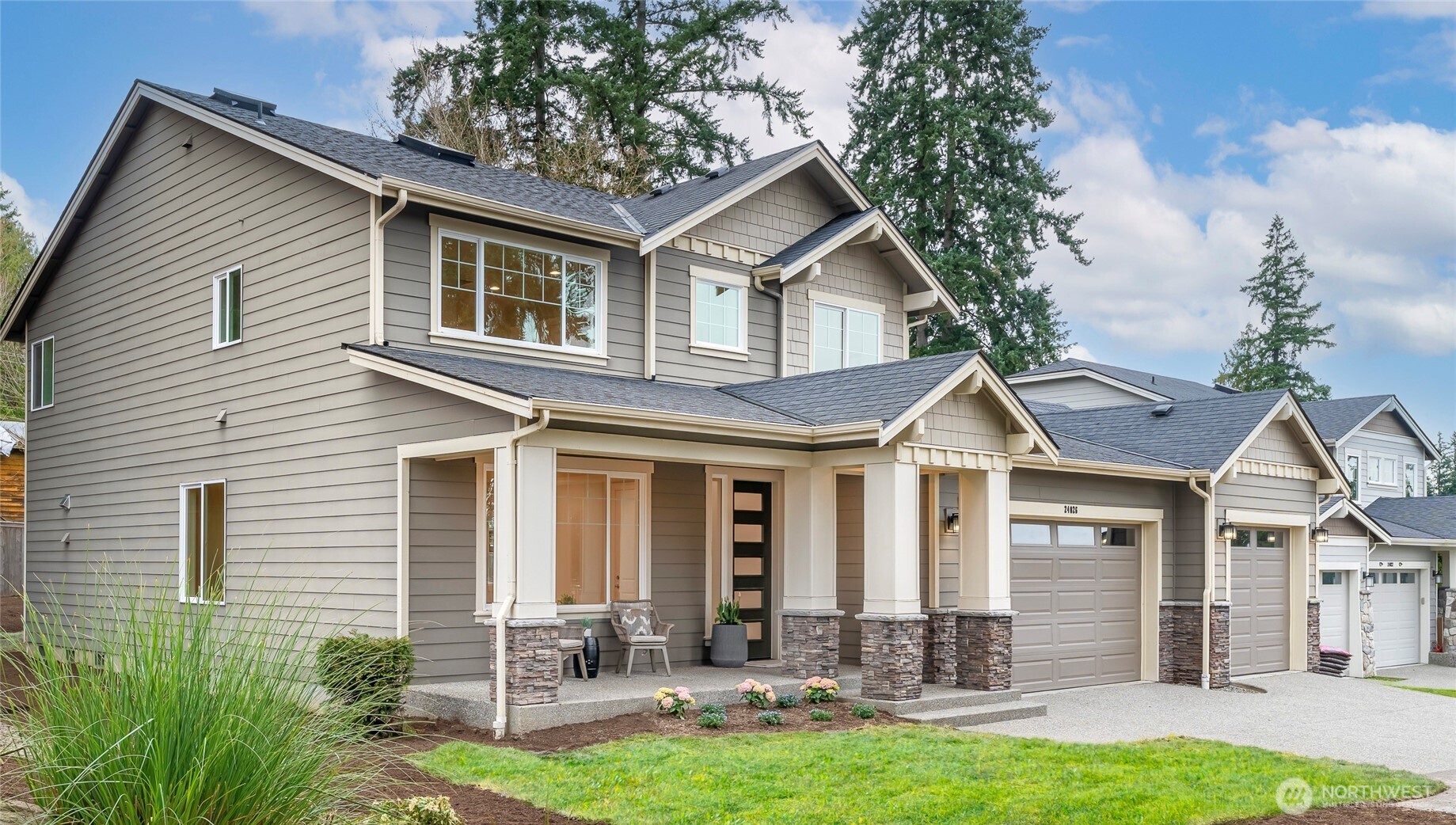 24026 Meridian Avenue South Bothell, WA 98021 - Photo 27 of 30 a front view of a house with a yard