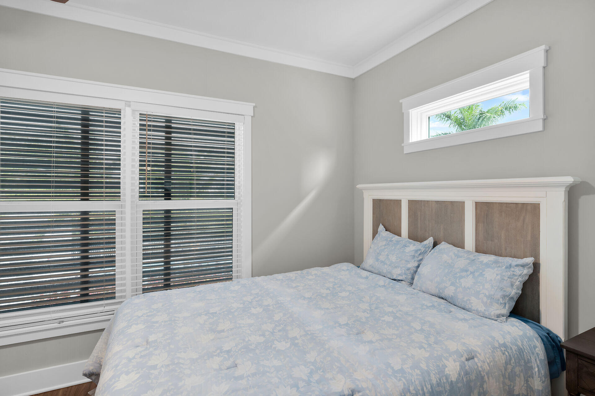 101 11th Street, Unit 19 Marathon, FL 33050 - Photo 9 of 27 a large white bed in a bedroom next to a window
