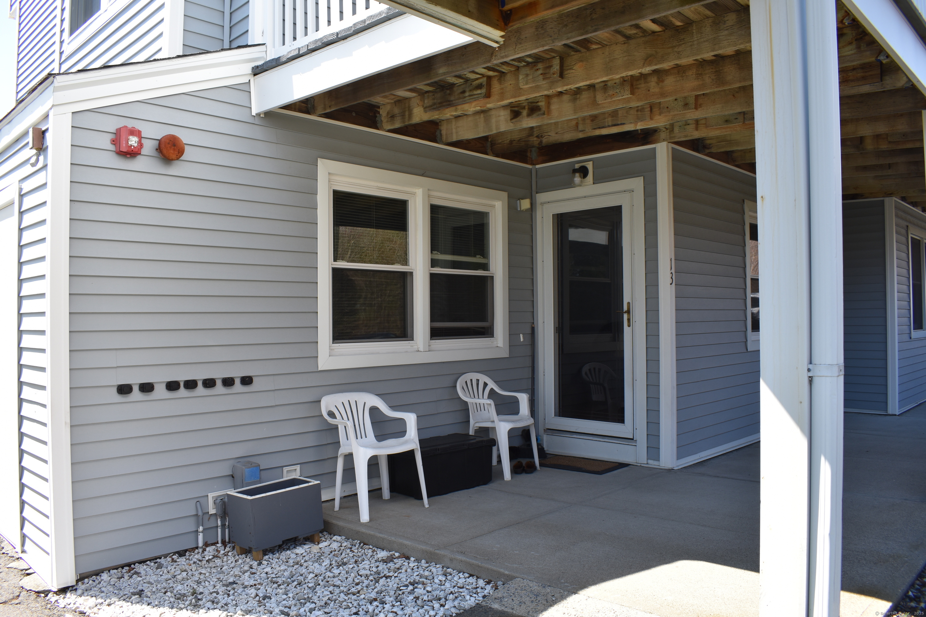a view of a porch with a bench