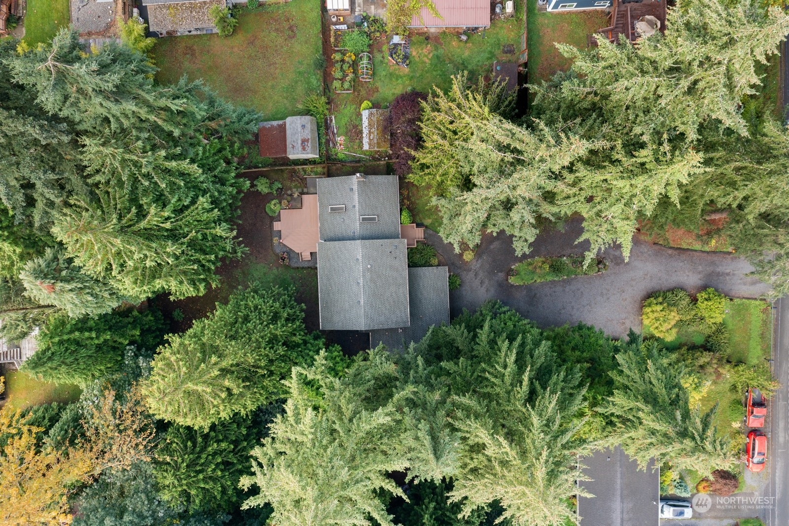 18 216th Street Southeast Bothell, WA 98021 - Photo 29 of 29 an aerial view of a house with a yard and garden