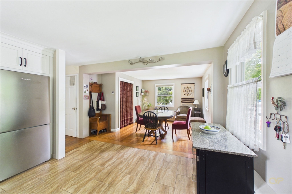 70 Neponset Street Canton, MA 02021 - Photo 16 of 39 a dining room with furniture and wooden floor