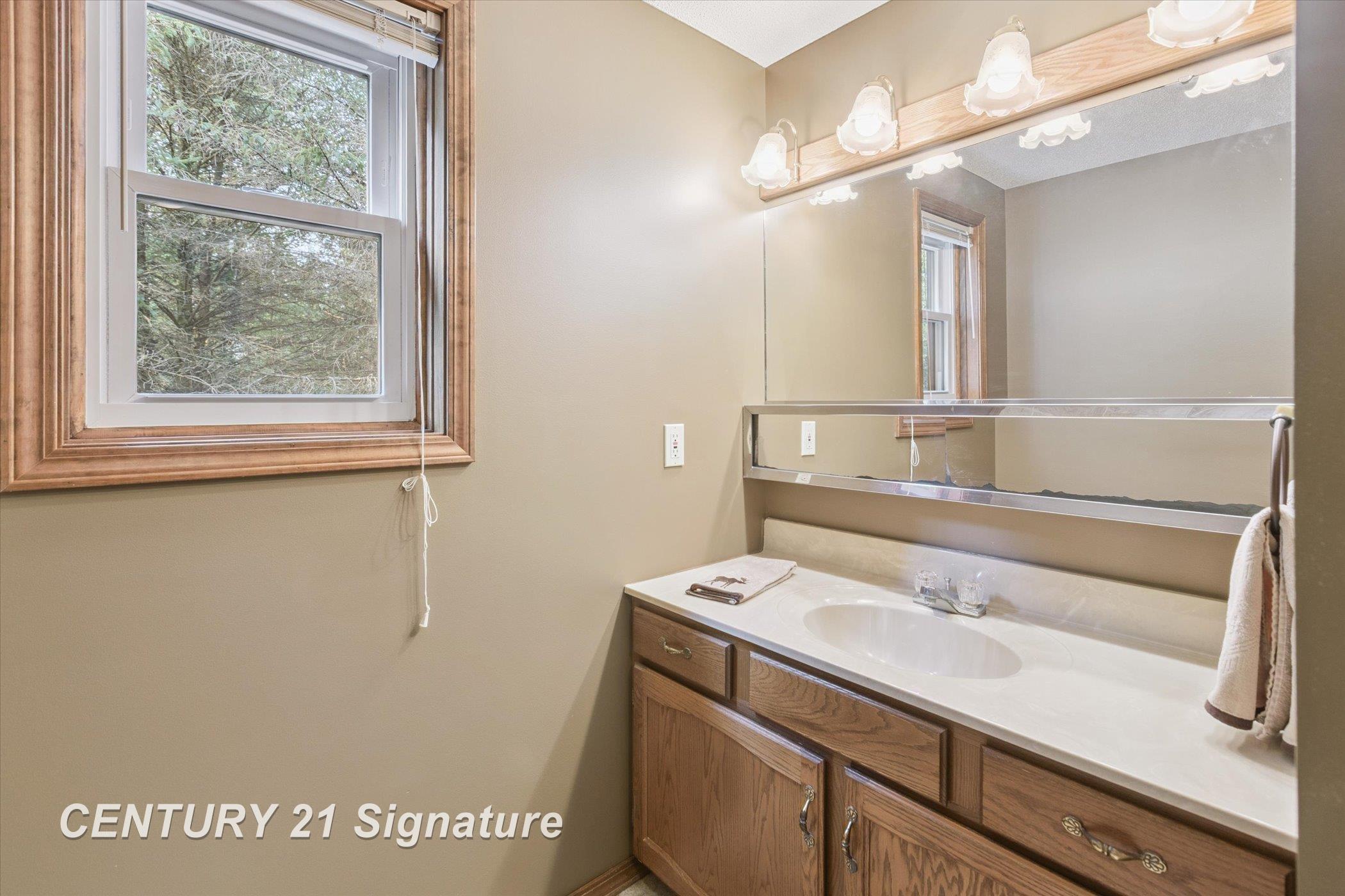 132 North 9 Mile Road Midland, MI 48640 - Photo 49 of 84 3rd full bathroom