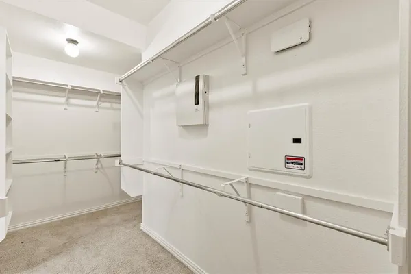 a view of an empty walk in closet