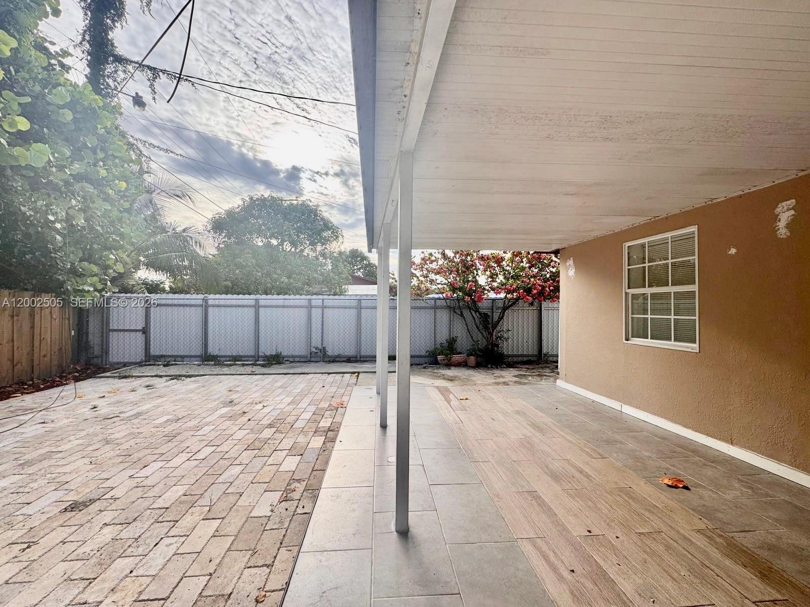 541 East 38th Street Hialeah, FL 33013 - Photo 10 of 14 a view of a backyard of the house