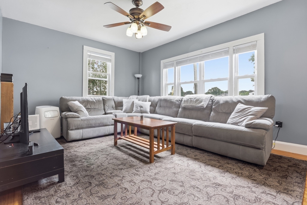 2 Cashman Road Peabody, MA 01960 - Photo 4 of 37 a living room with furniture and a large window
