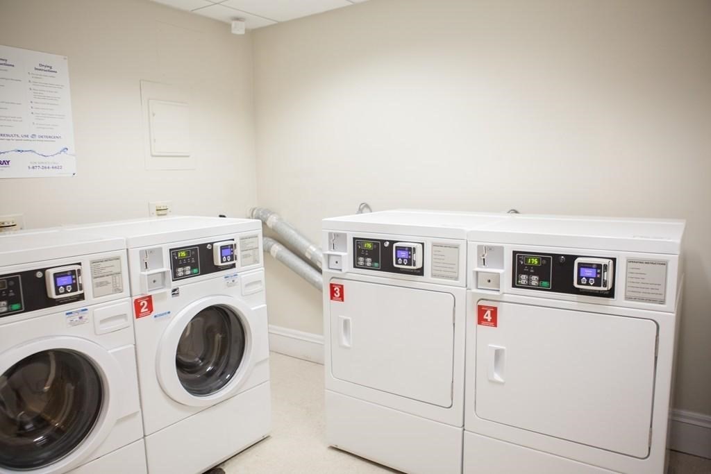 21 Beacon Street, Unit 6D Boston, MA 02108 - Photo 13 of 13 a utility room with dryer and washer