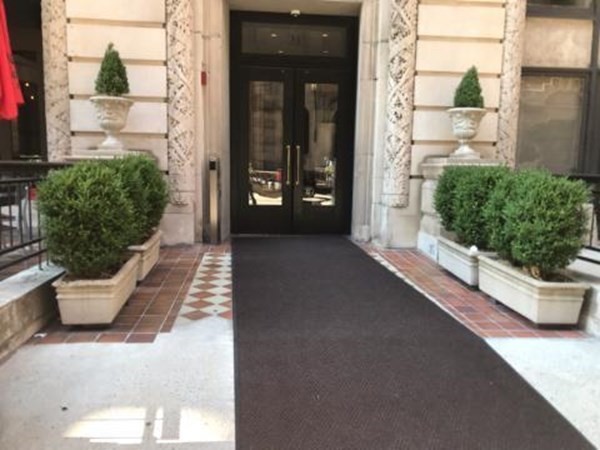 21 Beacon Street, Unit 6D Boston, MA 02108 - Photo 7 of 13 a view of a path along with potted plants
