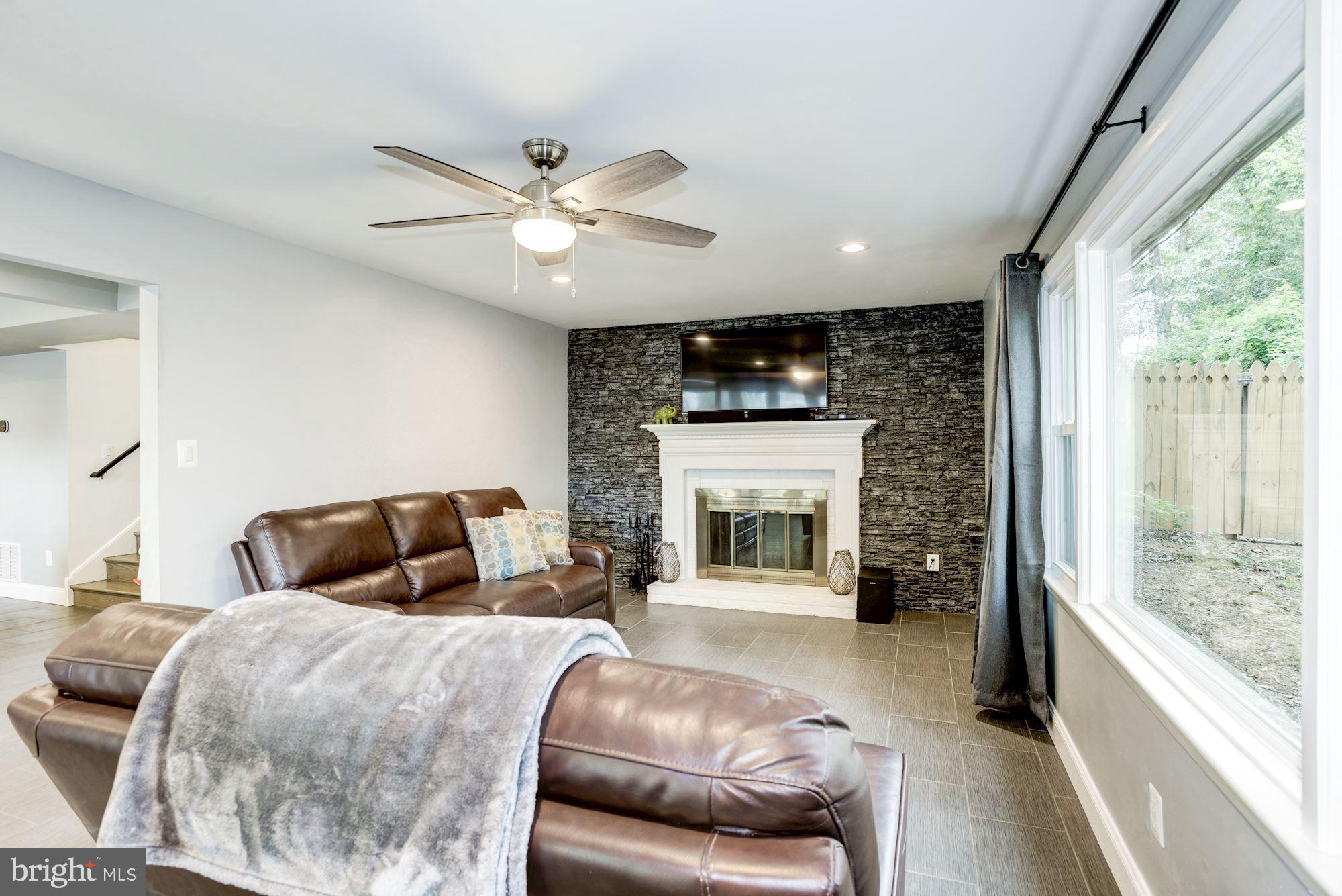 8410 Wagon Wheel Road Alexandria, VA 22309 - Photo 14 of 52 Custom feature wall w/ fireplace