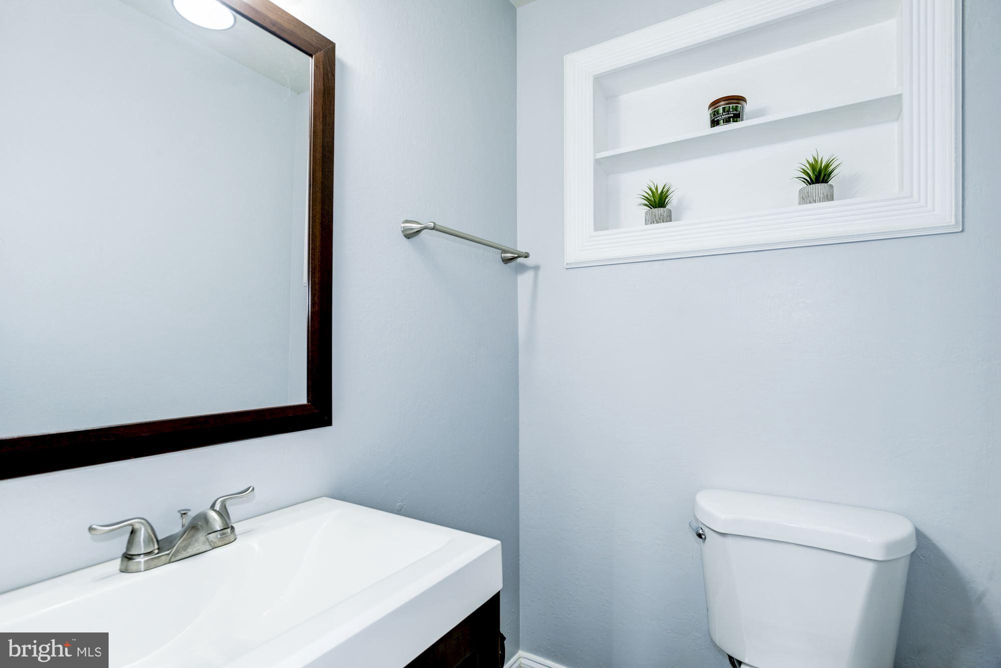 8410 Wagon Wheel Road Alexandria, VA 22309 - Photo 16 of 52 Half bath - on the main level