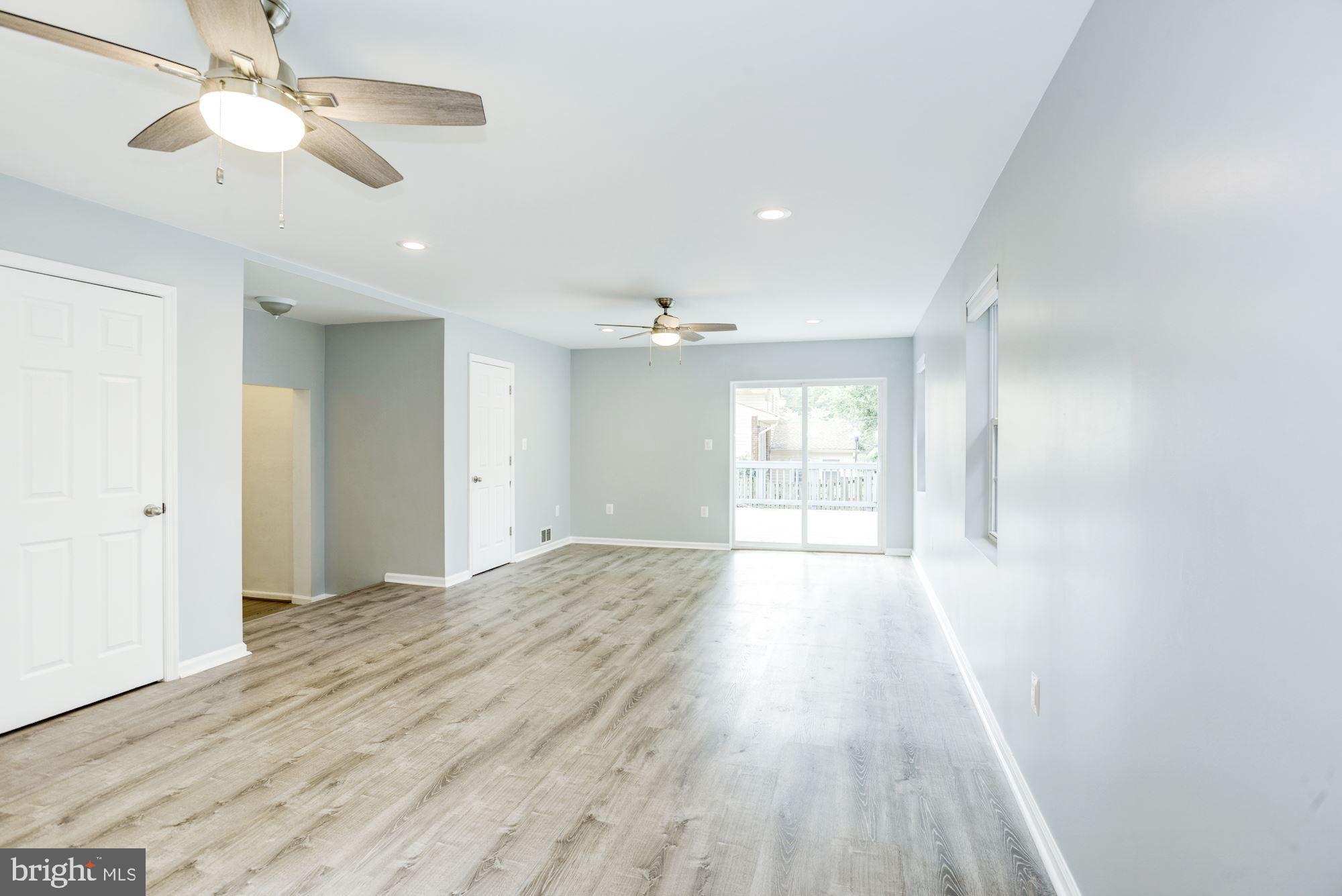 8410 Wagon Wheel Road Alexandria, VA 22309 - Photo 19 of 52 Two ceiling fans and loads of light