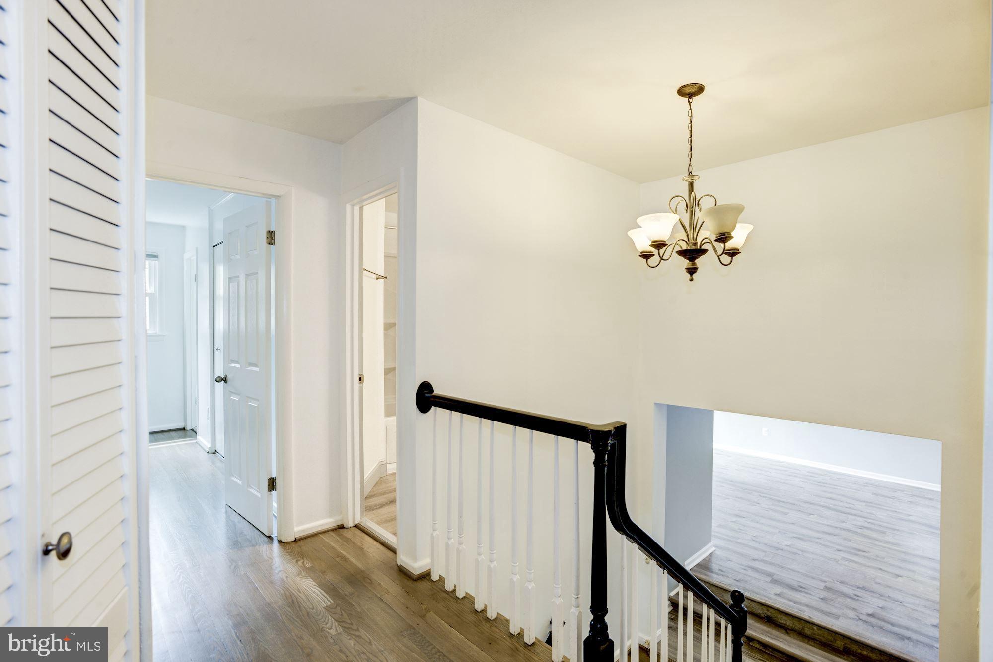 8410 Wagon Wheel Road Alexandria, VA 22309 - Photo 22 of 52 Second to third level landing