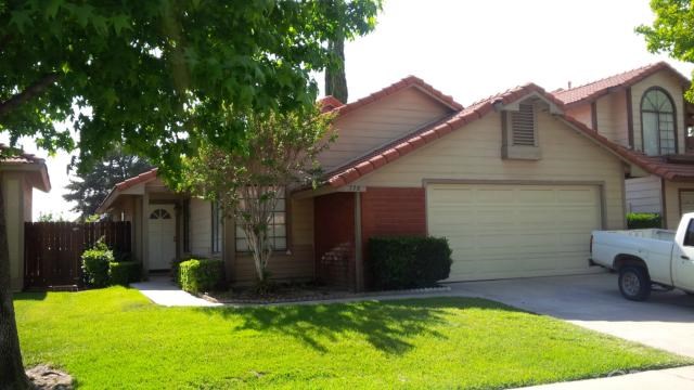 776 North Quince Avenue Rialto, CA 92376 - Photo 1 of 1 a view of a house with backyard and a tree