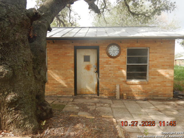 15397 Cassiano Road Elmendorf, TX 78112 - Photo 12 of 29 a view of entrance gate of a house
