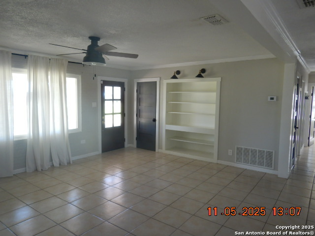 15397 Cassiano Road Elmendorf, TX 78112 - Photo 19 of 29 a view of an empty room and window