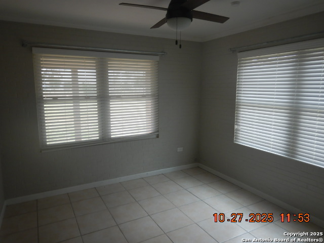 15397 Cassiano Road Elmendorf, TX 78112 - Photo 25 of 29 an empty room with a window